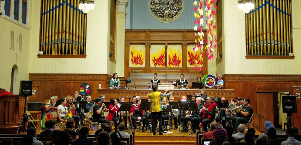 San Francisco Pride Band performing at Old First Church during the 2024 Pep Band Pride Concert